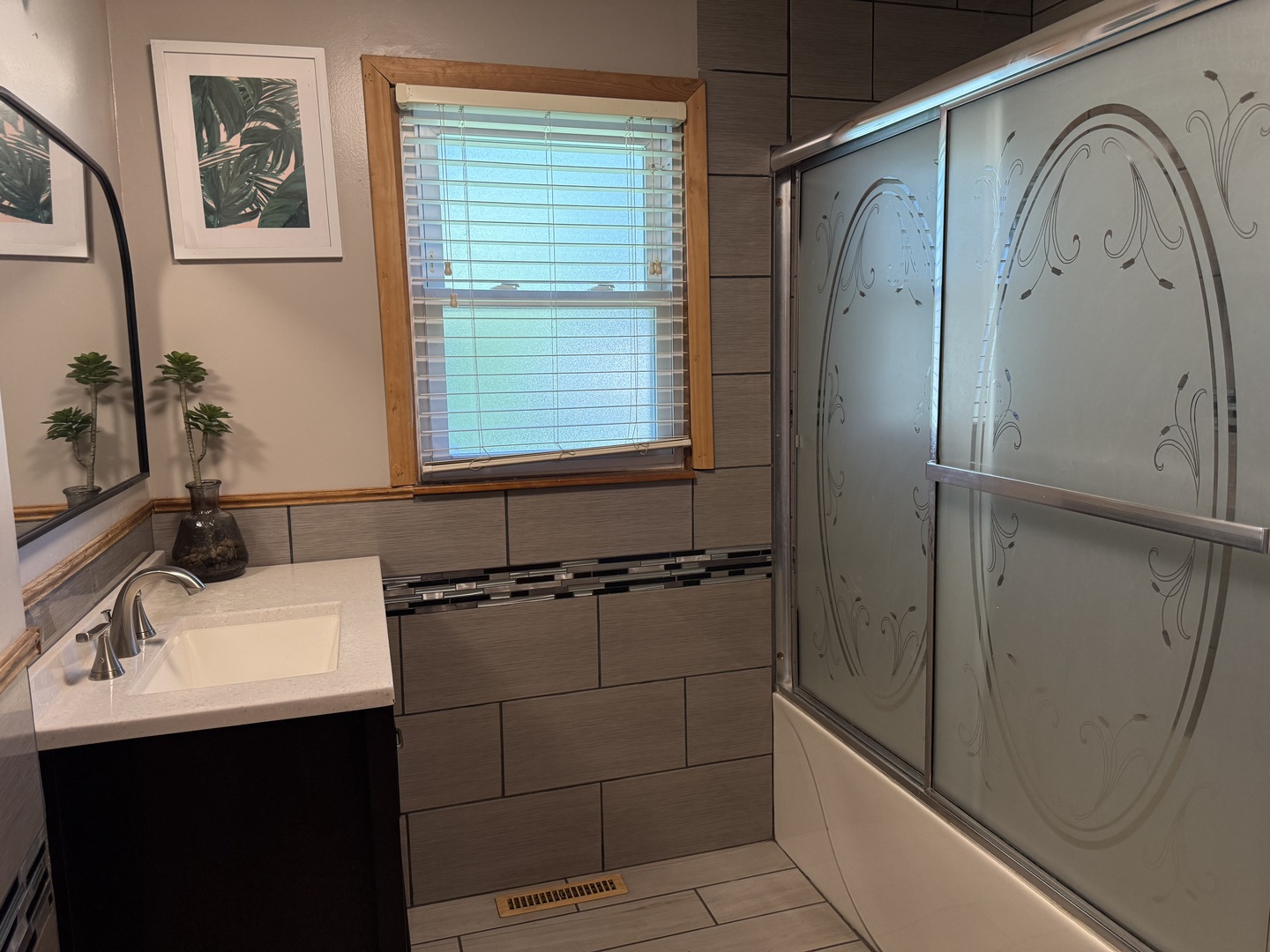 218 West 1st Street Spring Valley, IL 61362 - Photo 26 of 30 a bathroom with a sink a mirror and a shower