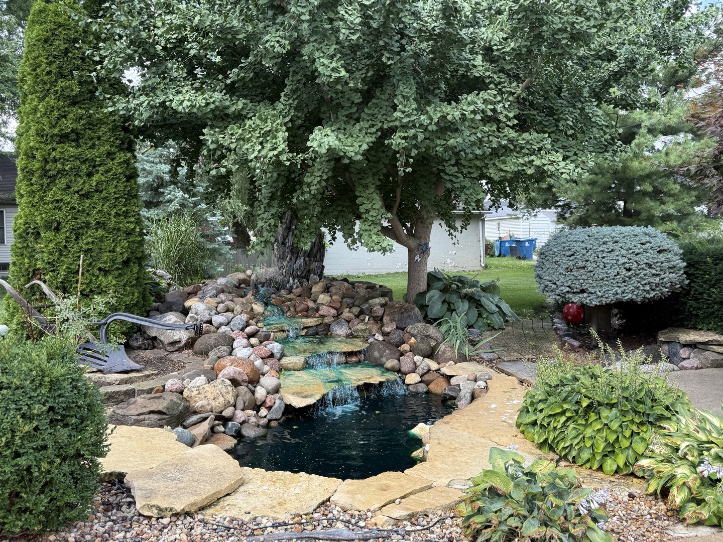 218 West 1st Street Spring Valley, IL 61362 - Photo 30 of 30 a view of a table and chairs in a garden