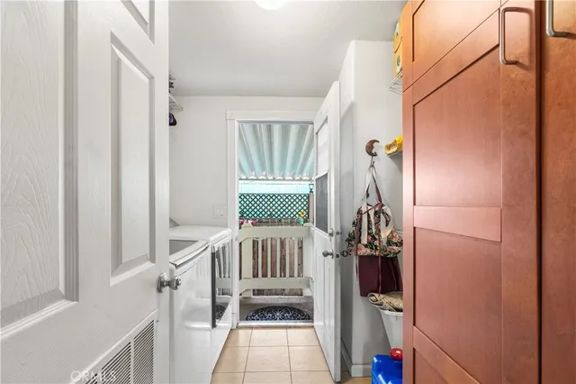 a view of entryway with a window and stairs