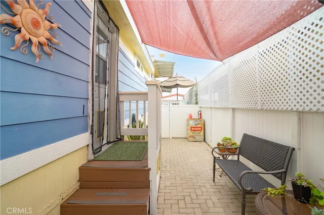 a bedroom with furniture and a chandelier