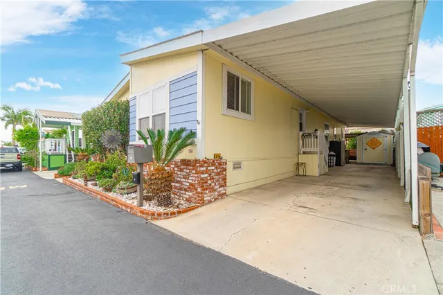 a view of a hall with lots of wooden floor