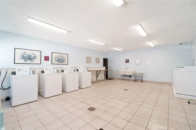 a view of a swimming pool with a lounge chair