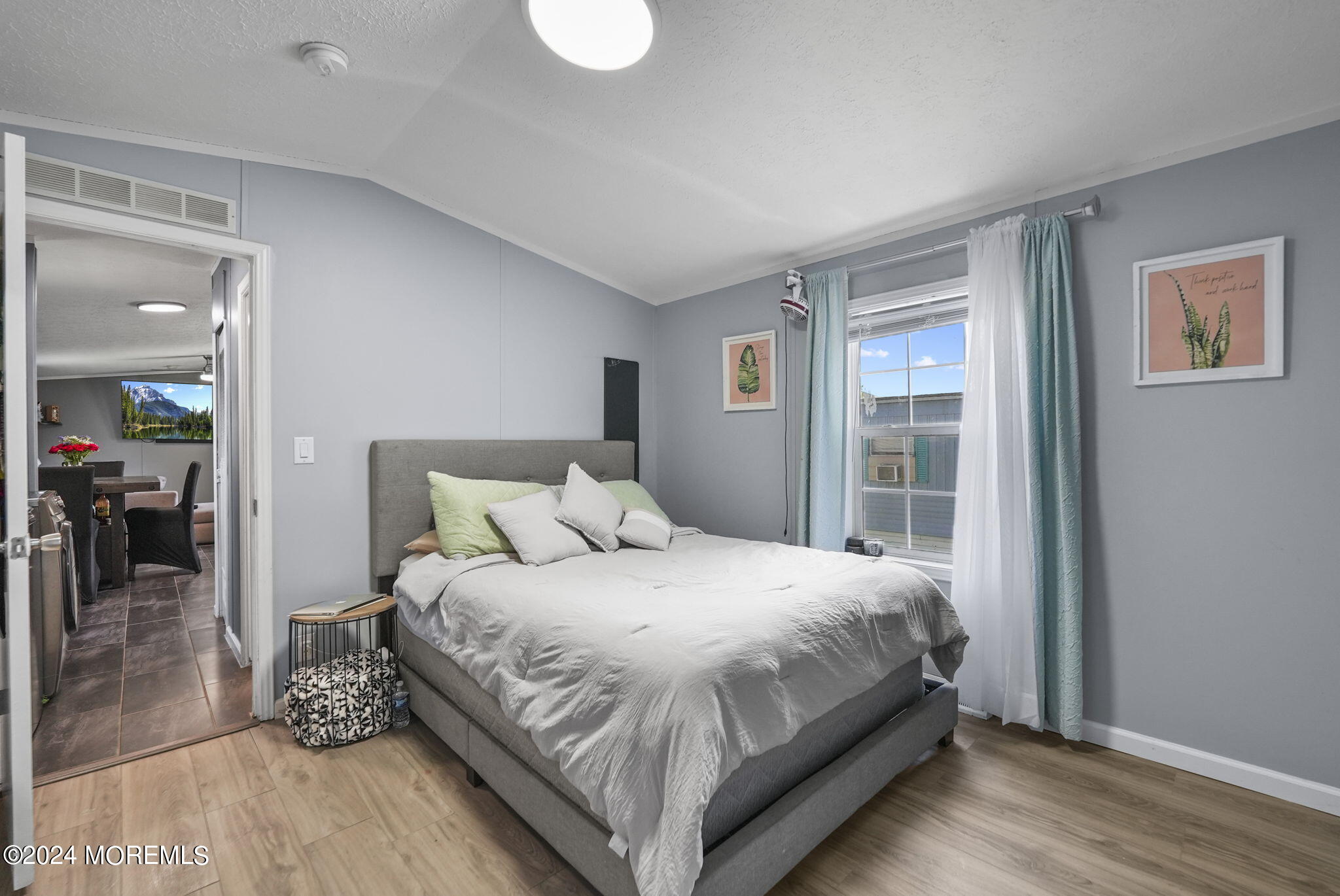 813 North Street Jackson, NJ 08527 - Photo 11 of 19 a bedroom with a large bed and a window
