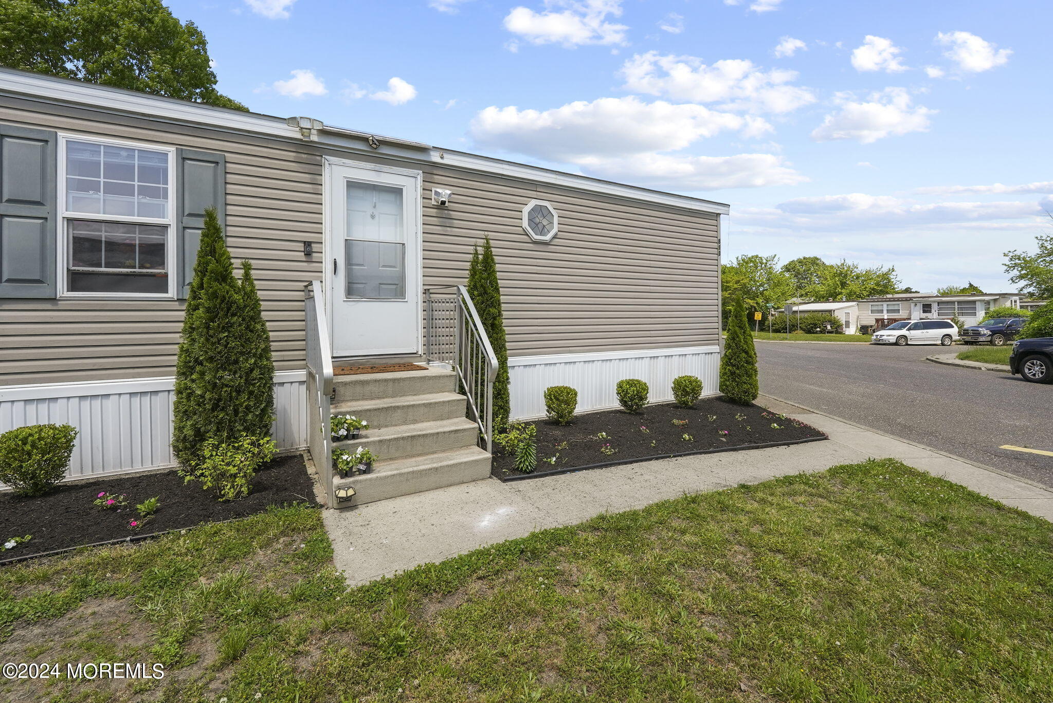 813 North Street Jackson, NJ 08527 - Photo 16 of 19 a view of a house with backyard and a garden
