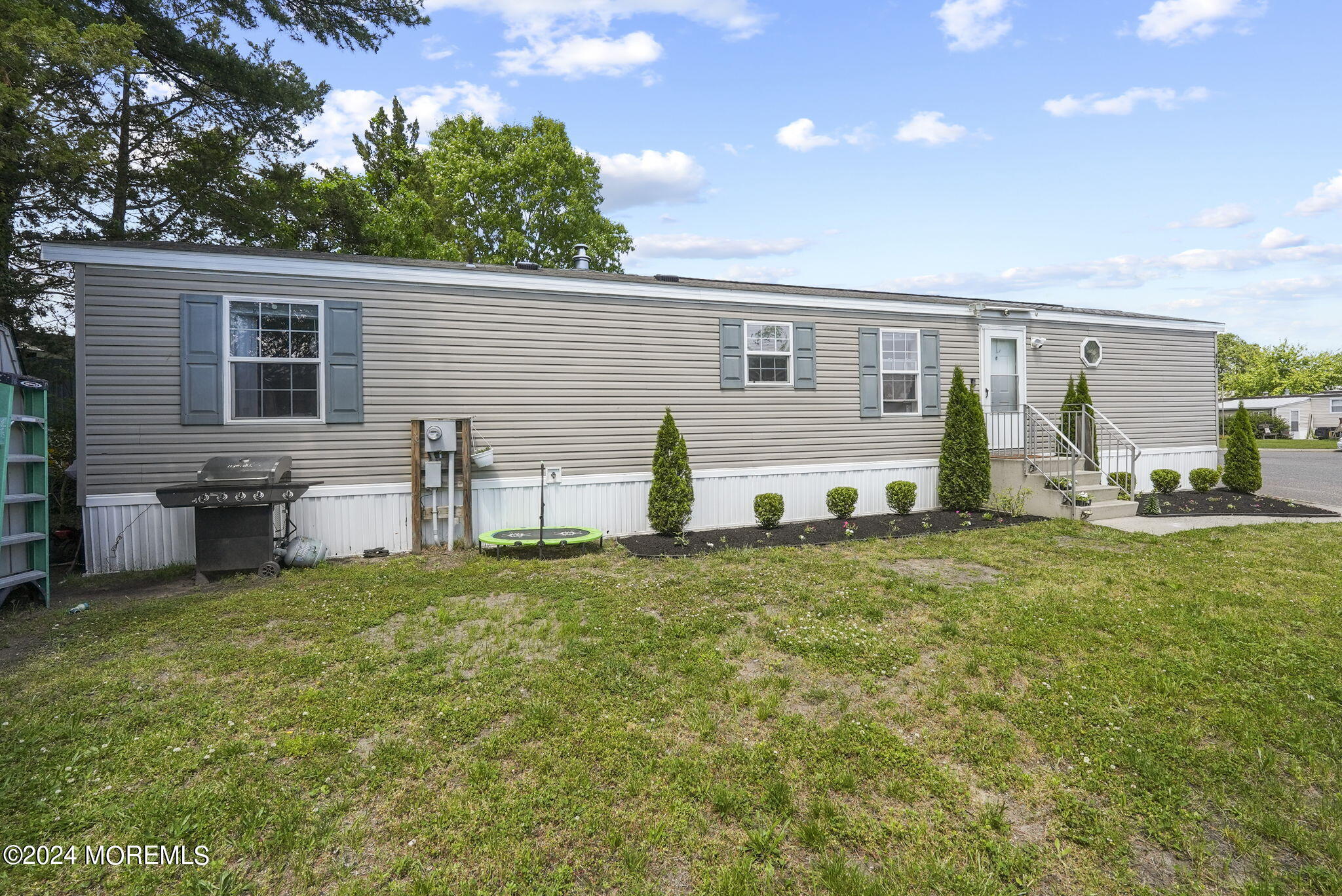 813 North Street Jackson, NJ 08527 - Photo 17 of 19 a view of a house with backyard