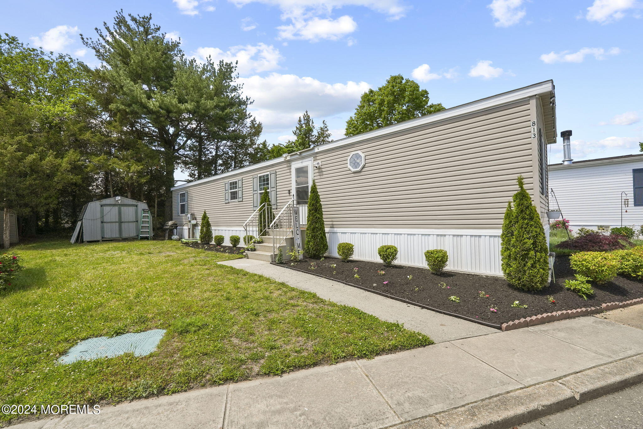 813 North Street Jackson, NJ 08527 - Photo 18 of 19 a front view of a house with garden