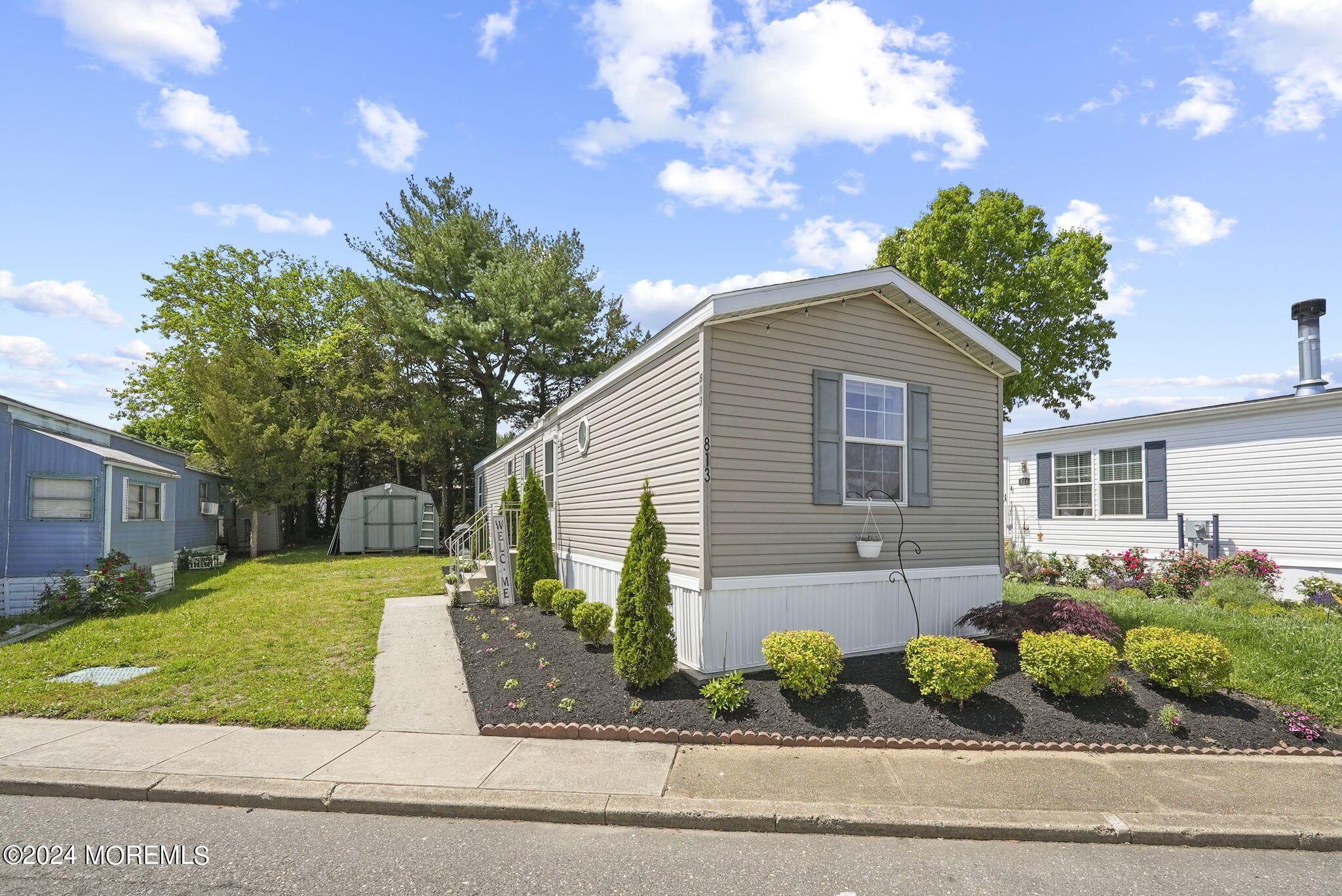 813 North Street Jackson, NJ 08527 - Photo 19 of 19 a front view of a house with garden