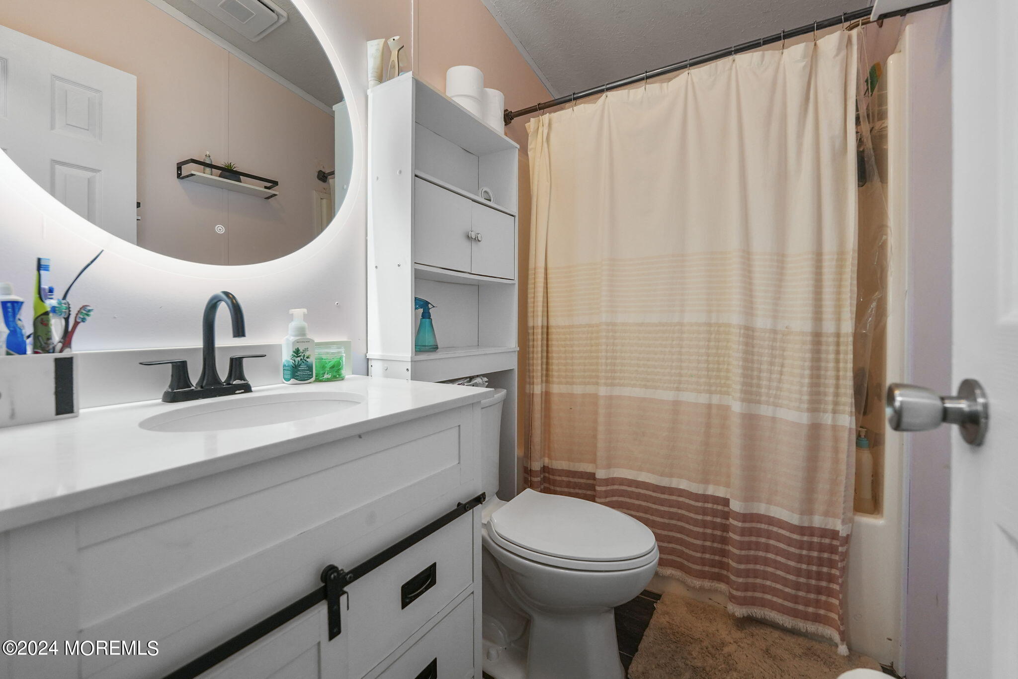 813 North Street Jackson, NJ 08527 - Photo 9 of 19 a bathroom with a sink a toilet and shower