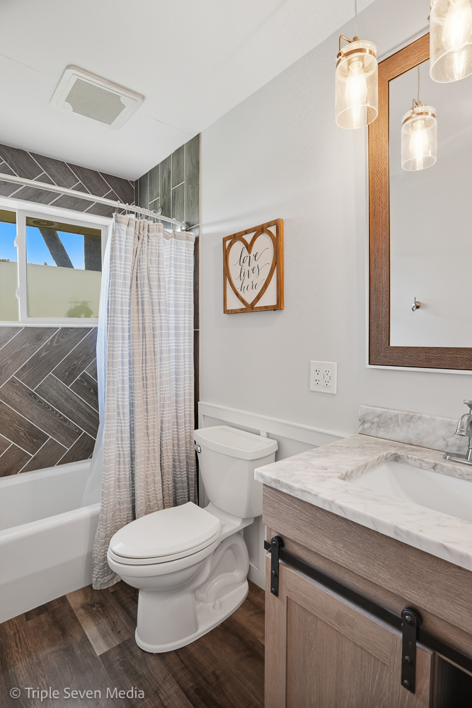 11307 German Church Road Willow Springs, IL 60480 - Photo 27 of 49 a bathroom with a sink a toilet and shower