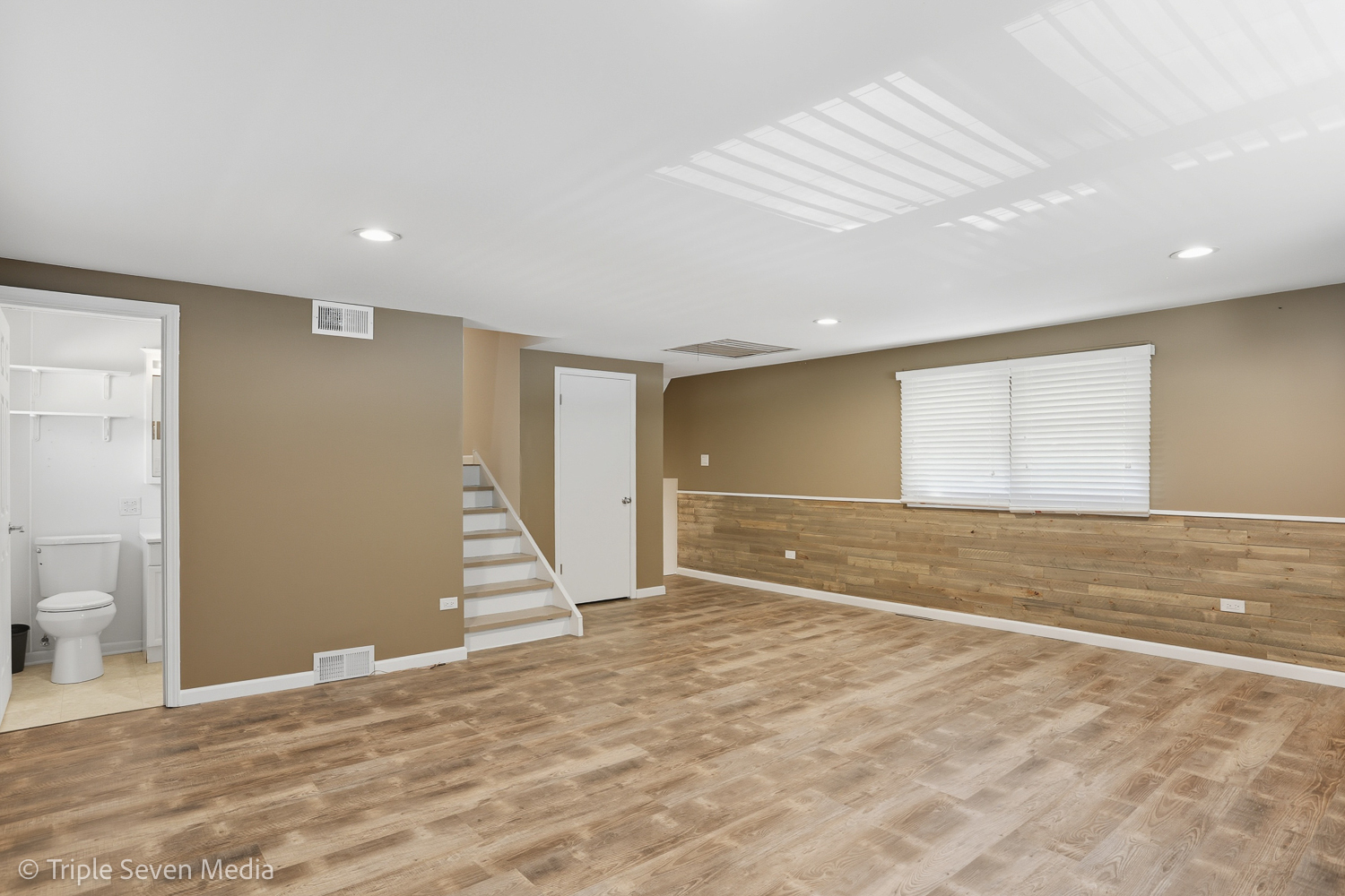 11307 German Church Road Willow Springs, IL 60480 - Photo 41 of 49 a view of an empty room with wooden floor and a window