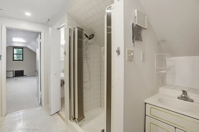 a kitchen with stainless steel appliances granite countertop a stove a refrigerator and a stove