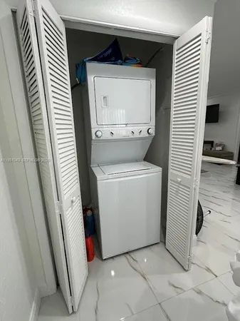 a utility room with a washer and dryer