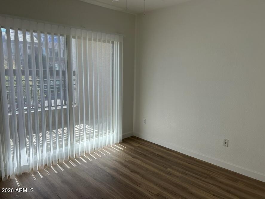 425 West Rio Salado Parkway, Unit 112 Tempe, AZ 85281 - Photo 11 of 17 a view of wooden floor and brick wall