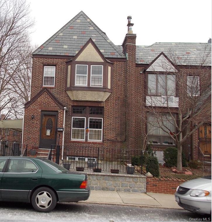 a car parked in front of a house
