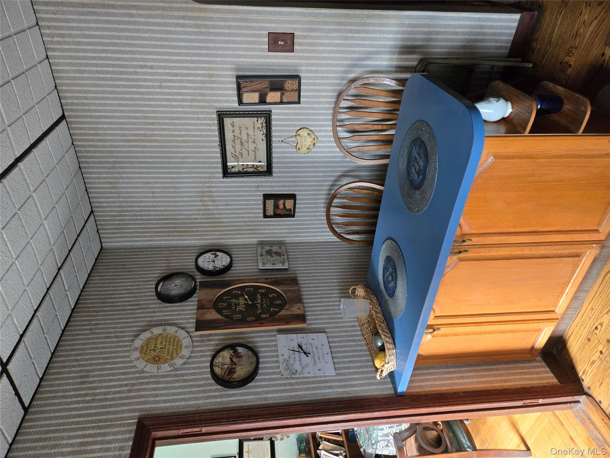 89-12 Rutledge Avenue Queens, NY 11385 - Photo 3 of 13 a view of a table and chairs in a room