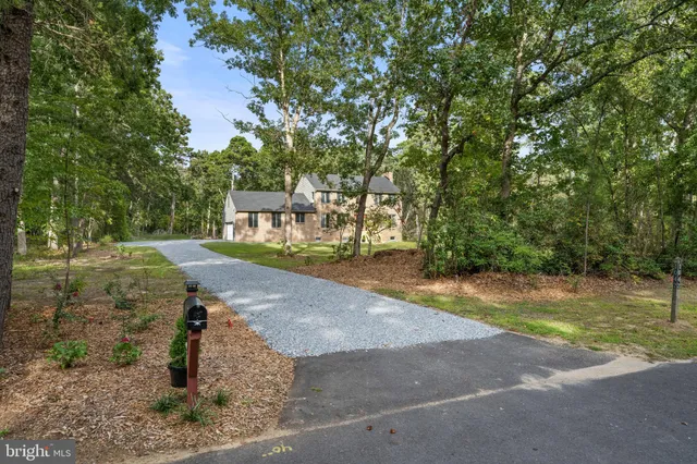a view of a yard with basketball ground