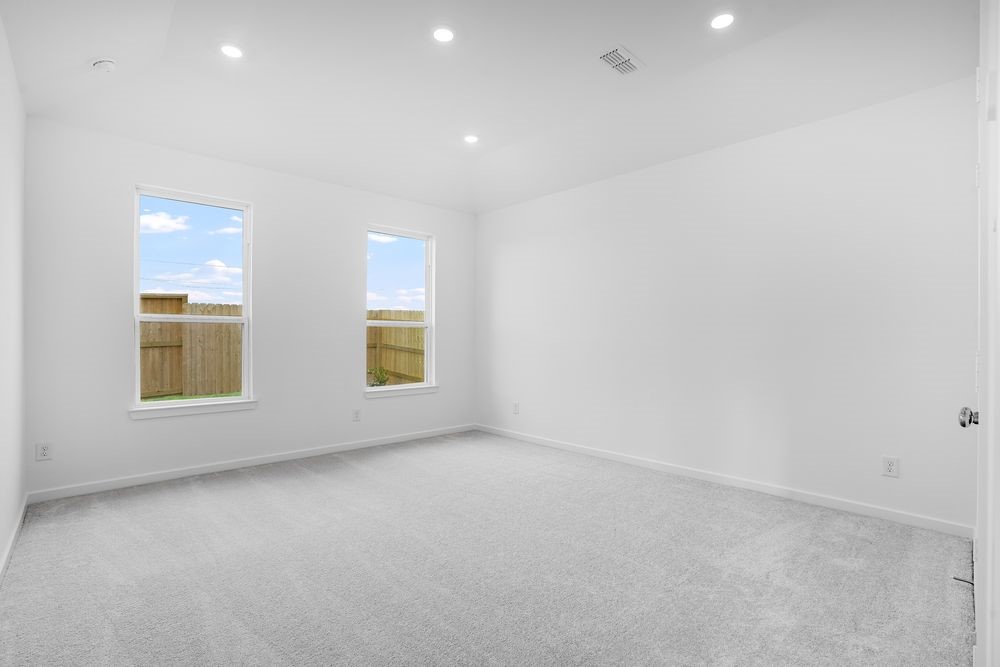 22130 Rangemore Drive Cypress, TX 77433 - Photo 11 of 36 an empty room with windows