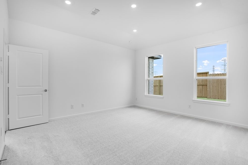 22130 Rangemore Drive Cypress, TX 77433 - Photo 12 of 36 a view of an empty room with a window