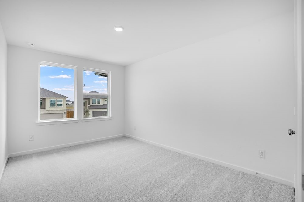 22130 Rangemore Drive Cypress, TX 77433 - Photo 16 of 36 an empty room with a window