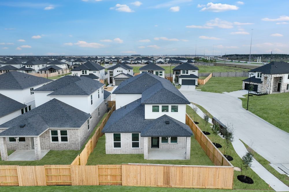 22130 Rangemore Drive Cypress, TX 77433 - Photo 24 of 36 an aerial view of a house with a ocean view