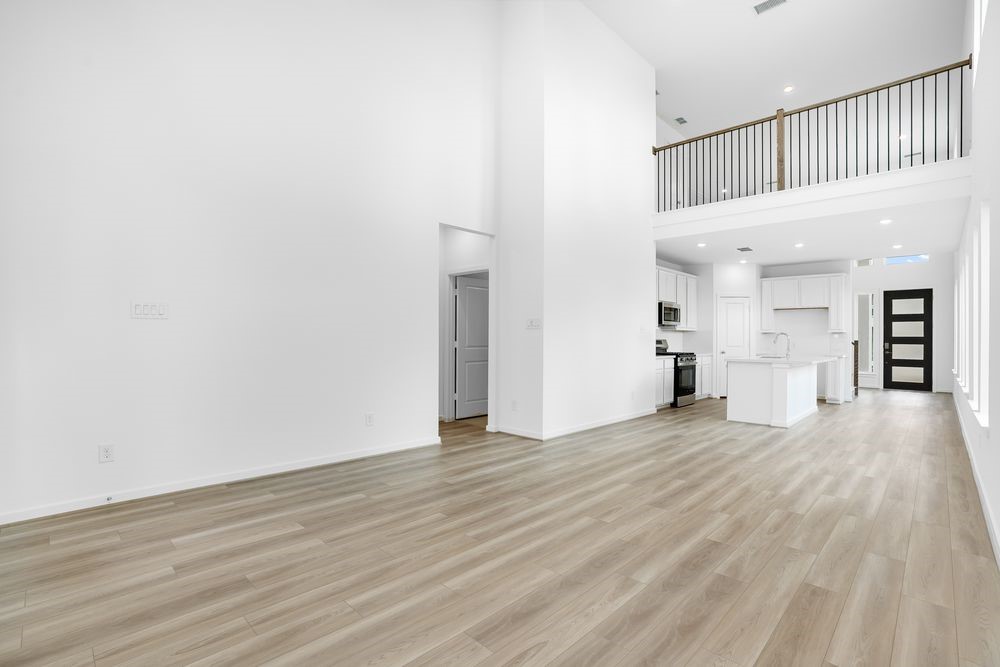 22130 Rangemore Drive Cypress, TX 77433 - Photo 8 of 36 a view of empty room with wooden floor