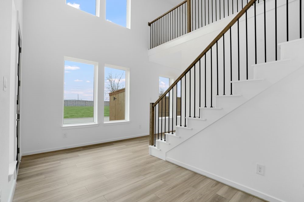 22130 Rangemore Drive Cypress, TX 77433 - Photo 9 of 36 a view of an entryway with wooden floor