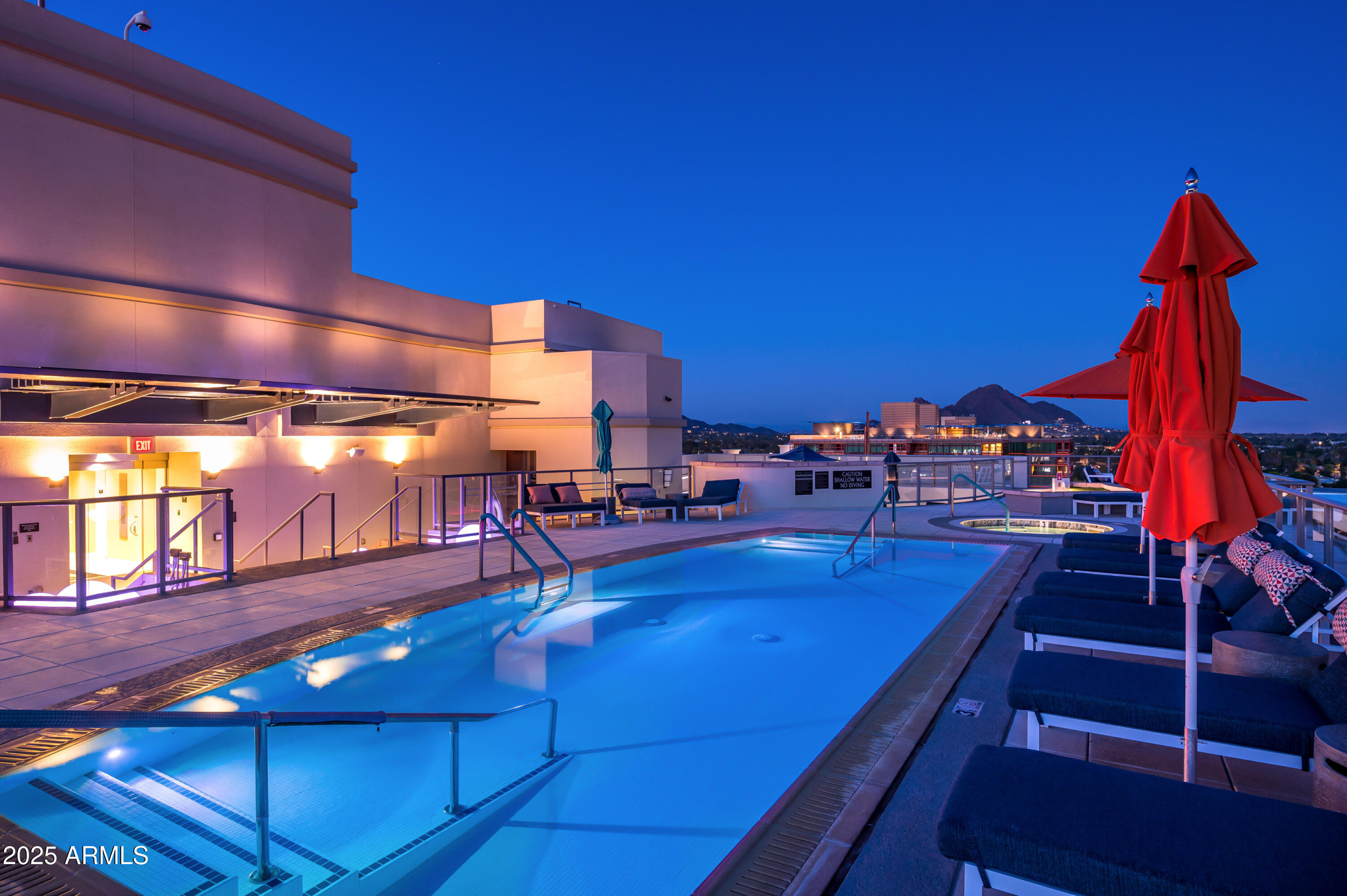 2211 East Camelback Road, Unit 601 Phoenix, AZ 85016 - Photo 46 of 61 Rooftop Evening