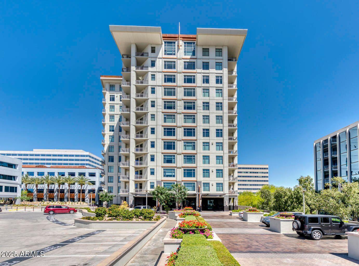 2211 East Camelback Road, Unit 601 Phoenix, AZ 85016 - Photo 49 of 61 a front view of a building with street view