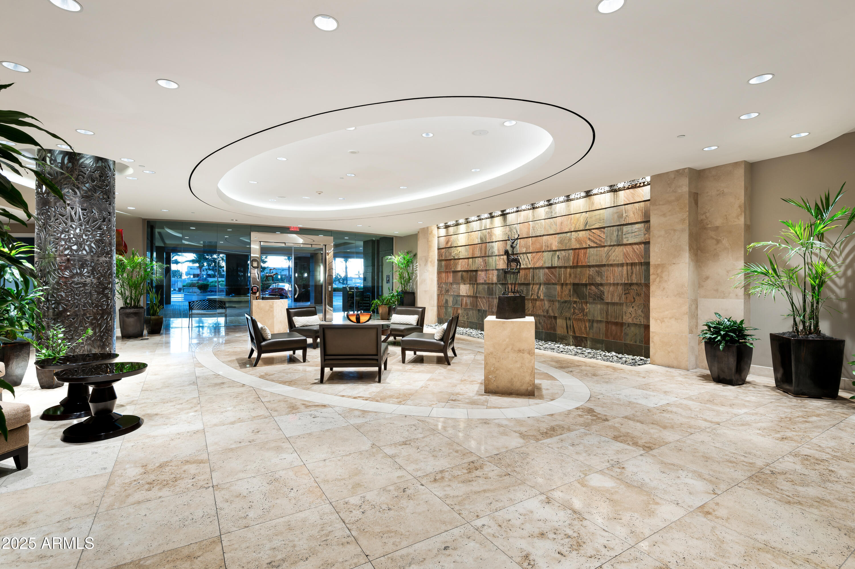 2211 East Camelback Road, Unit 601 Phoenix, AZ 85016 - Photo 54 of 61 a living room with furniture