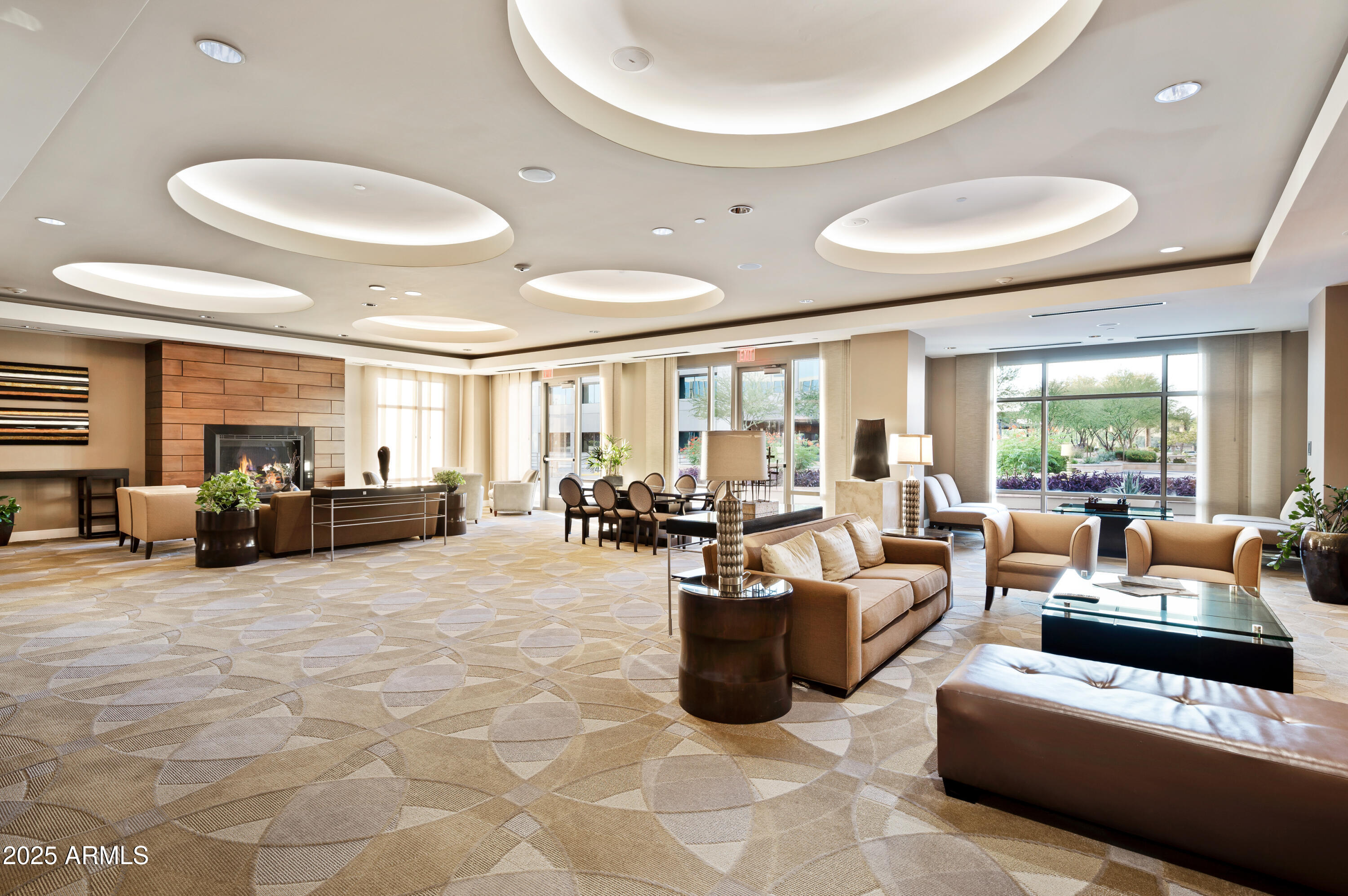 2211 East Camelback Road, Unit 601 Phoenix, AZ 85016 - Photo 56 of 61 a living room with furniture and a large window
