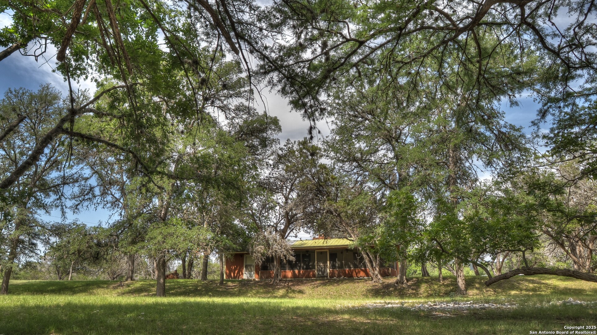 154 Weston Road Leakey, TX 78873 - Photo 16 of 39 a view of a house with a yard