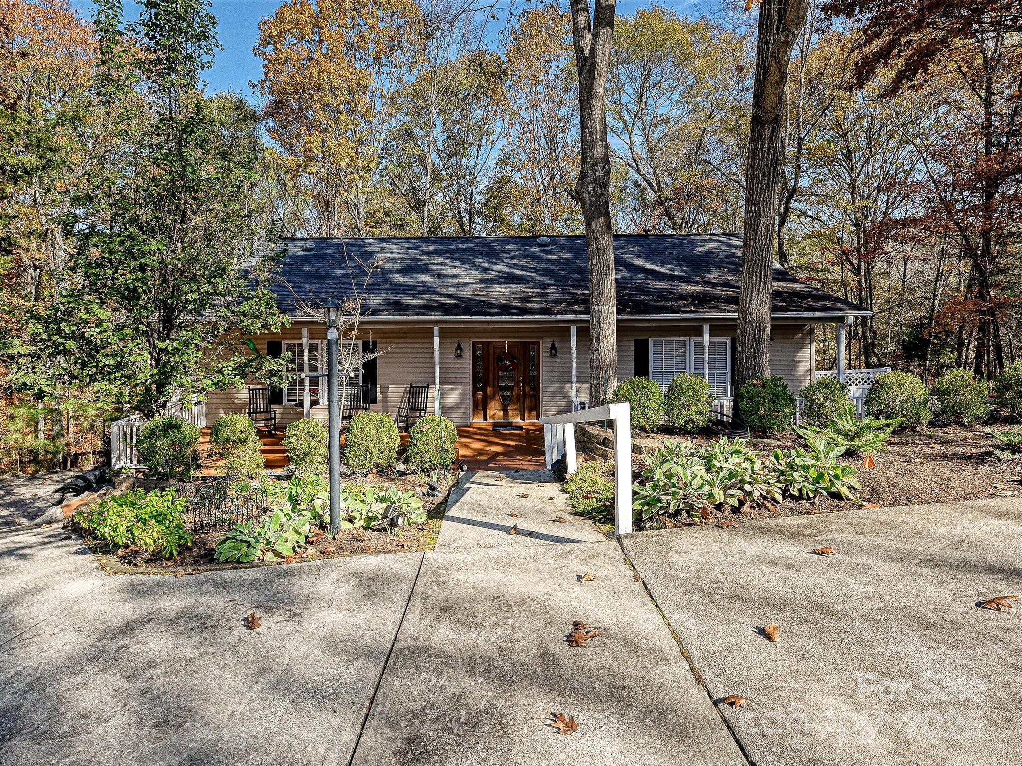 25040 Timberlake Drive Tega Cay, SC 29708 - Photo 5 of 40 a house view with a sitting space