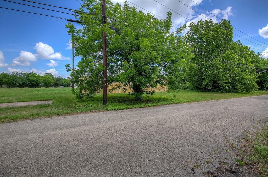 414 North Neal Street Commerce, TX 75428 - Photo 13 of 13 a view of a house with a big yard
