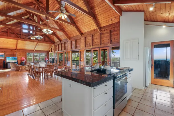 a view of a balcony with wooden floor