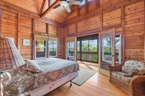 a view of balcony with wooden floor