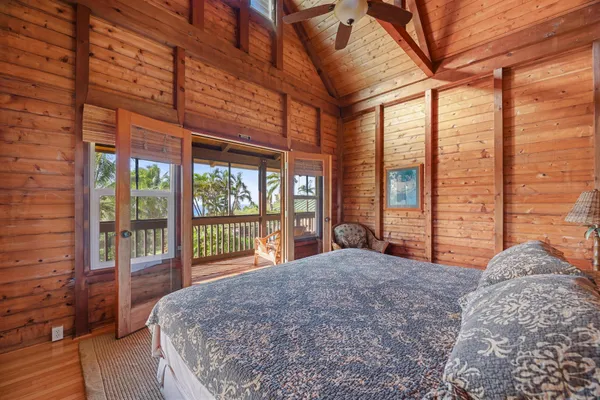 a bathroom with a sink a toilet and shower curtain