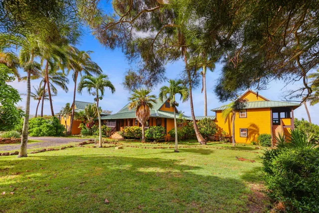 a view of a swimming pool with an outdoor space and seating area