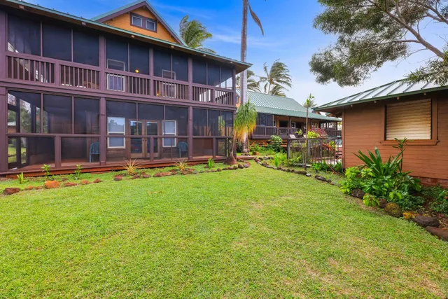 a view of a swimming pool with an outdoor seating