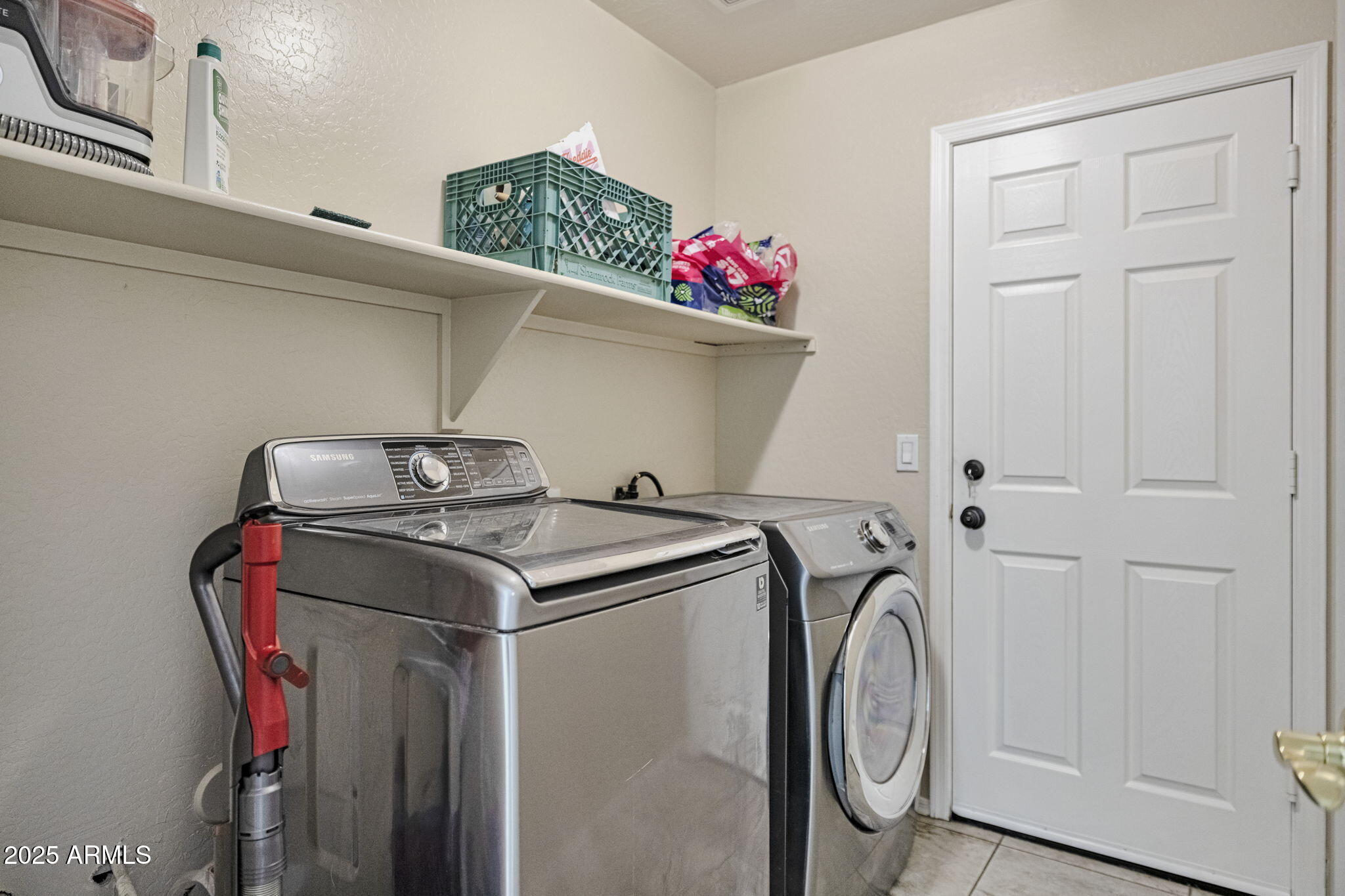 9705 West Riverside Avenue Tolleson, AZ 85353 - Photo 23 of 26 a utility room with dryer and washer