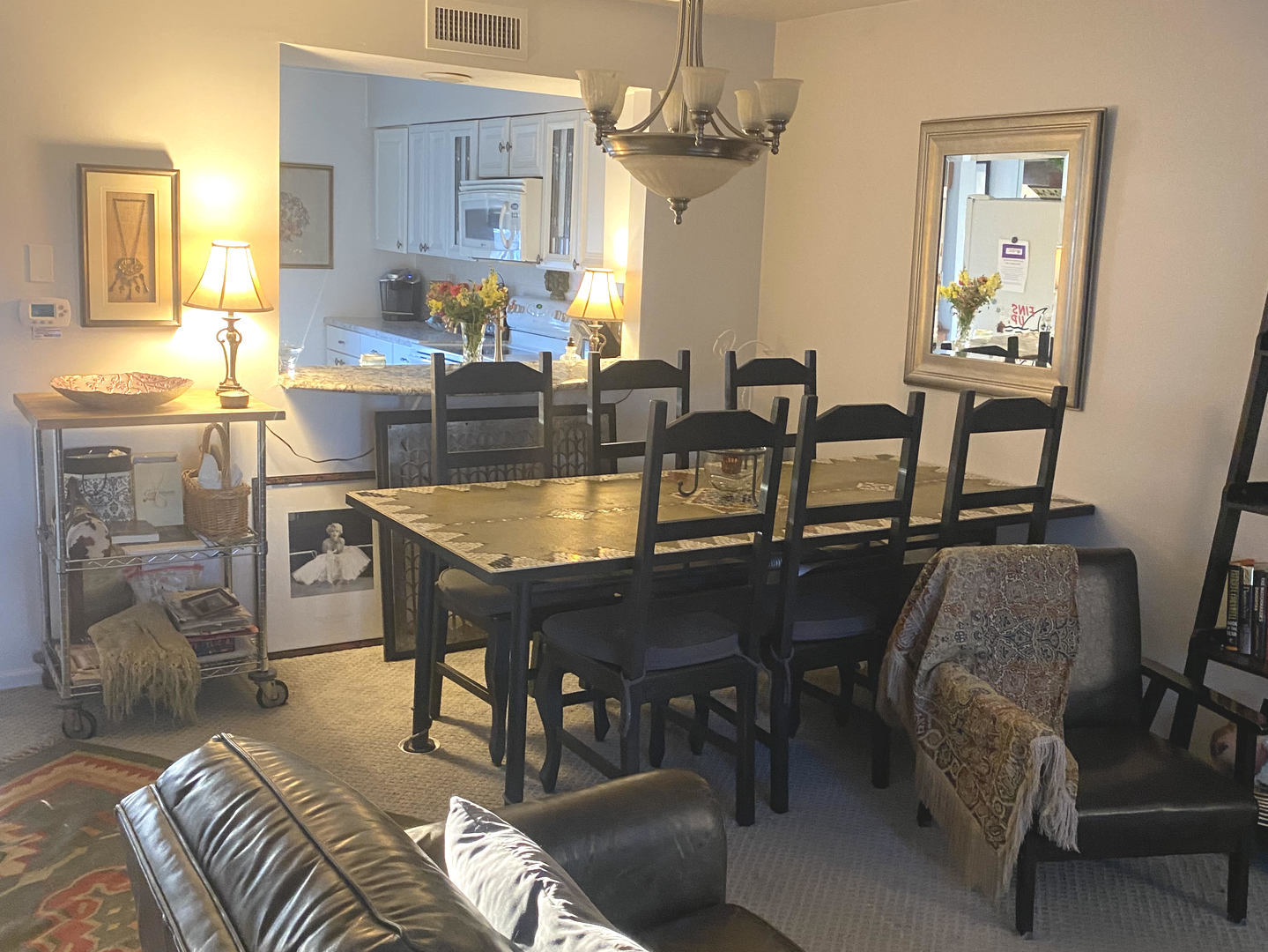 450 North Main Street, Unit S103 Wauconda, IL 60084 - Photo 11 of 14 a view of a dining room with furniture and a chandelier