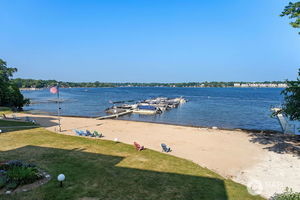 450 North Main Street, Unit S103 Wauconda, IL 60084 - Photo 3 of 14 a view of a lake with a mountain