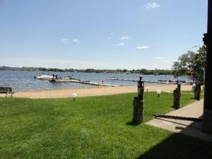 450 North Main Street, Unit S103 Wauconda, IL 60084 - Photo 7 of 14 a view of a lake with a big yard