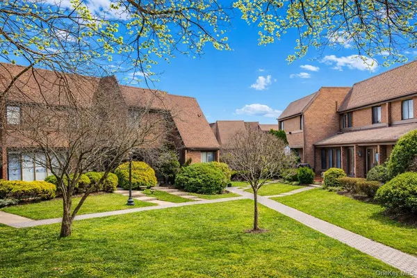 a house view with a garden space