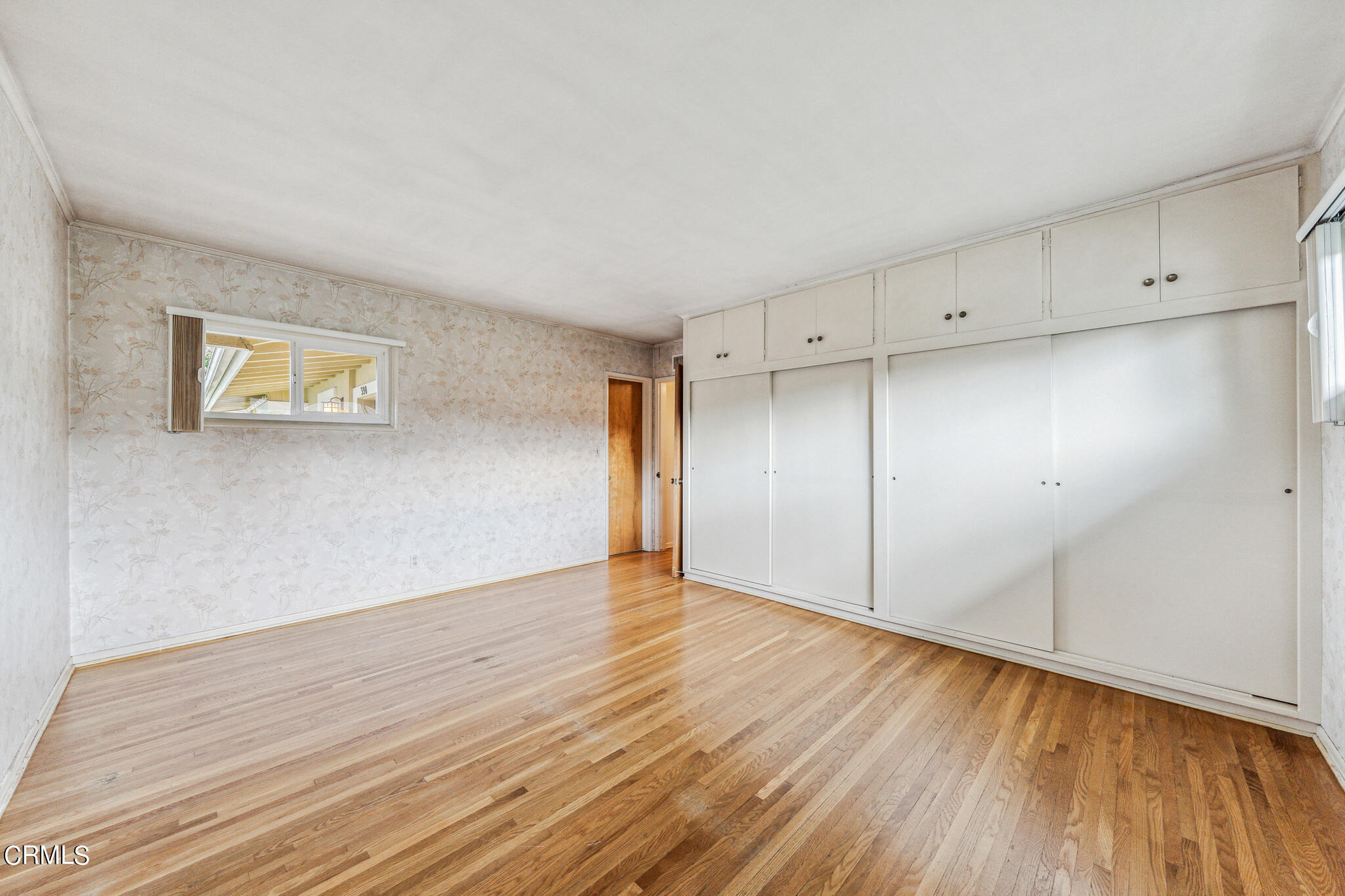 390 San Juan Place Pasadena, CA 91107 - Photo 15 of 29 a view of an empty room with wooden floor