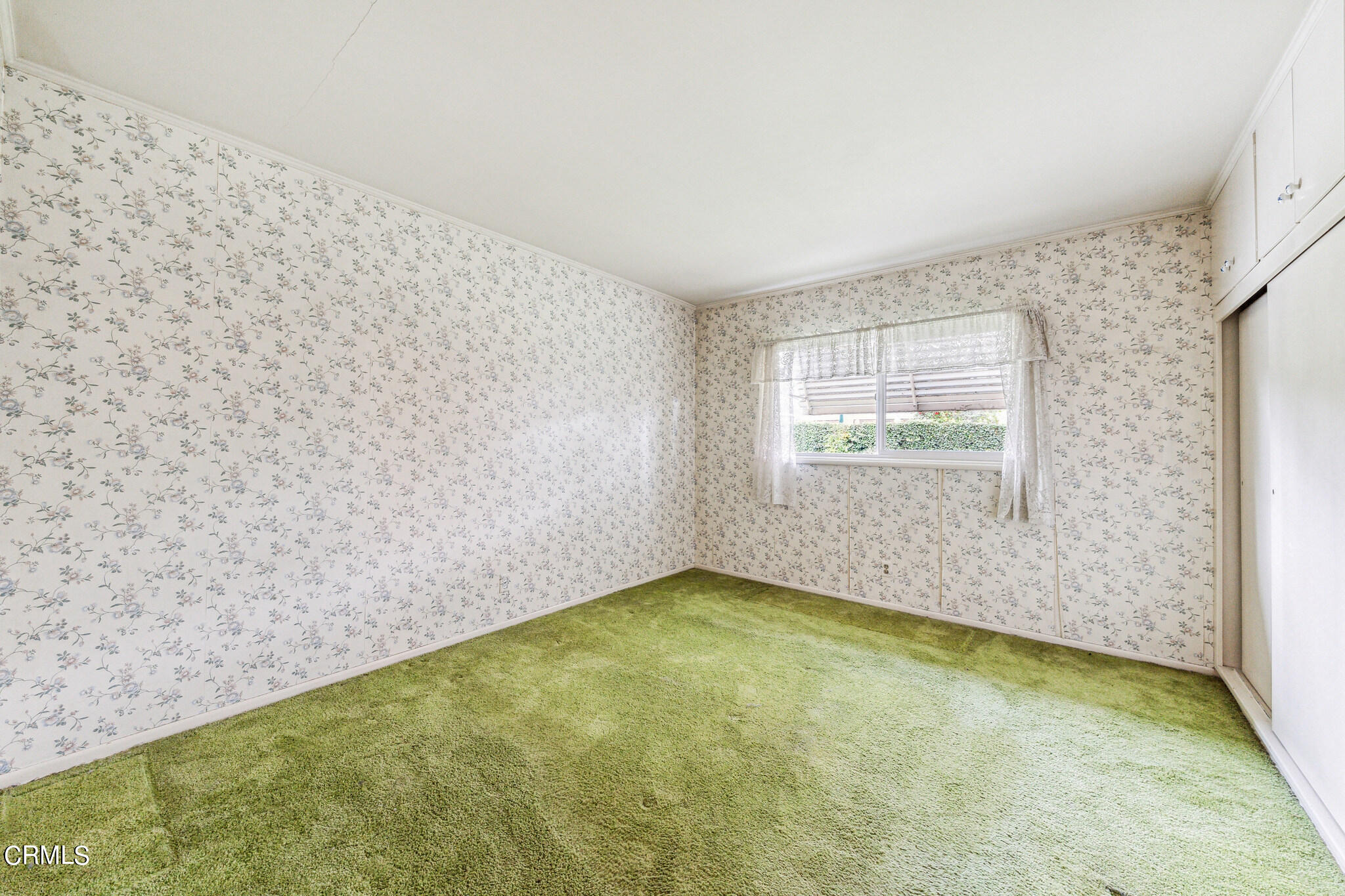 390 San Juan Place Pasadena, CA 91107 - Photo 17 of 29 a view of an empty room with a window