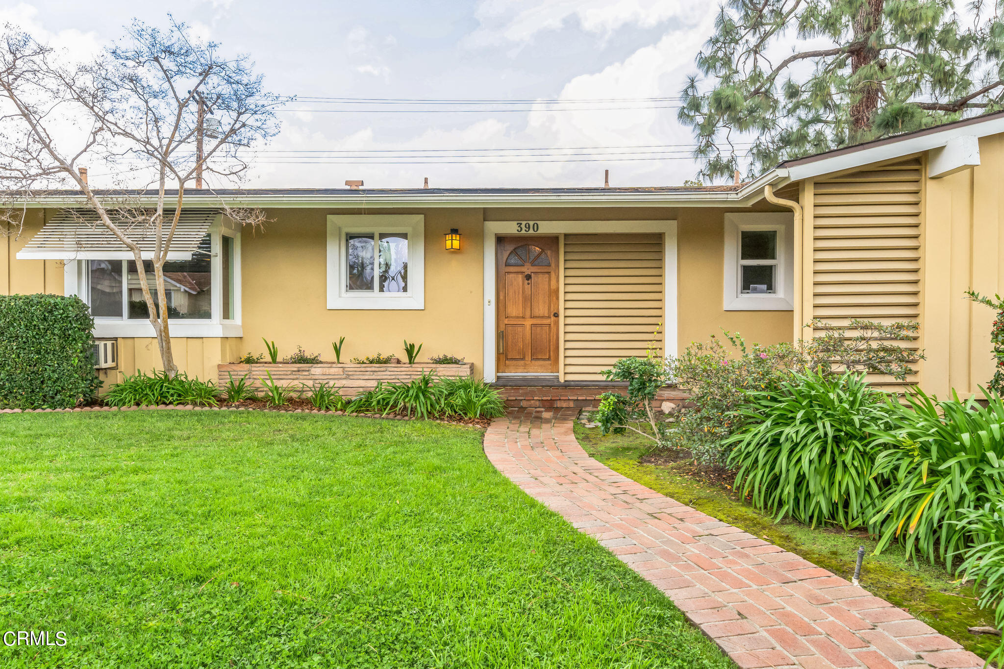 390 San Juan Place Pasadena, CA 91107 - Photo 28 of 29 a front view of a house with garden
