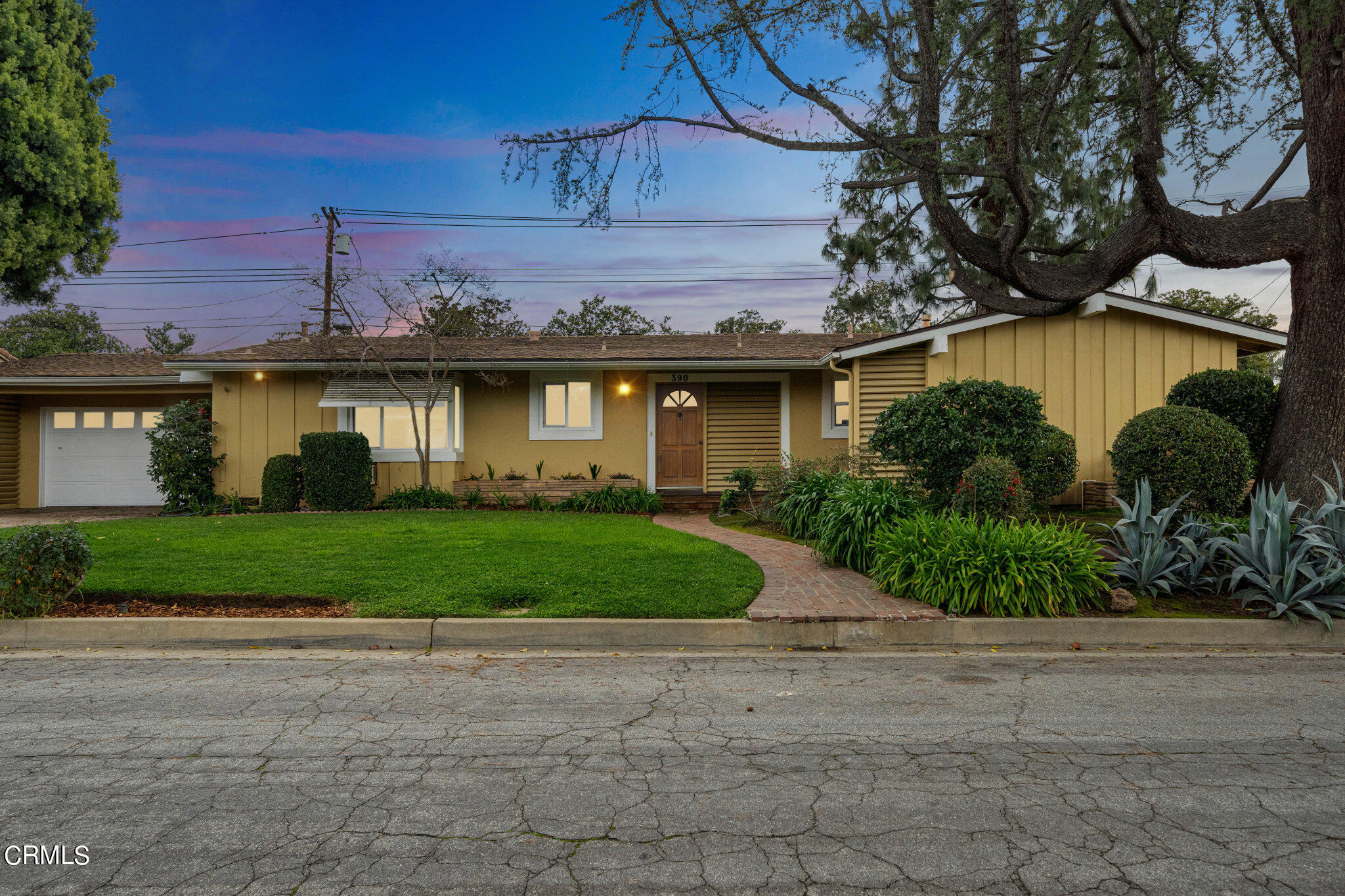 390 San Juan Place Pasadena, CA 91107 - Photo 29 of 29 a front view of a house with garden