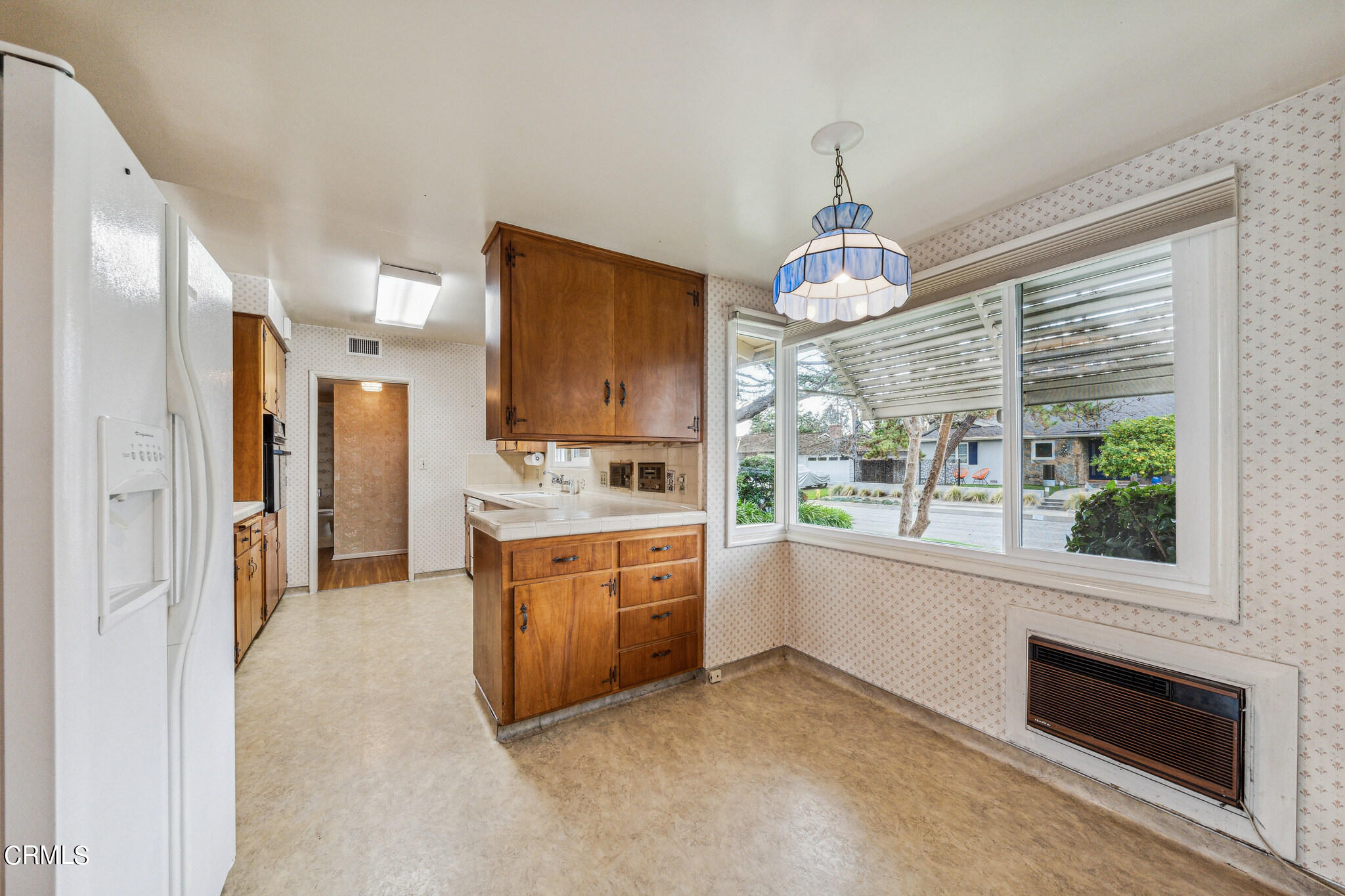 390 San Juan Place Pasadena, CA 91107 - Photo 10 of 29 a large kitchen with stainless steel appliances granite countertop a stove and a sink