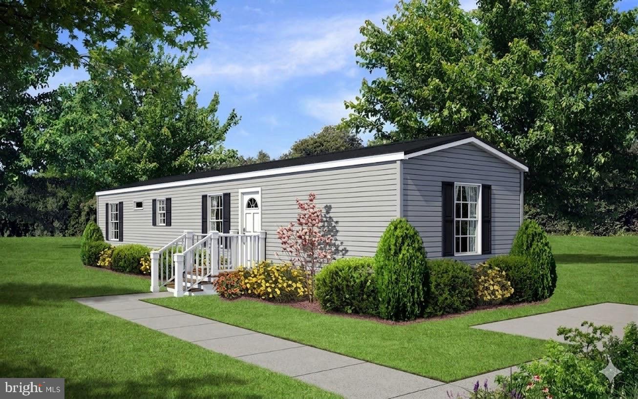 35 Terrace Drive Spring City, PA 19475 - Photo 1 of 6 a front view of house with yard and green space