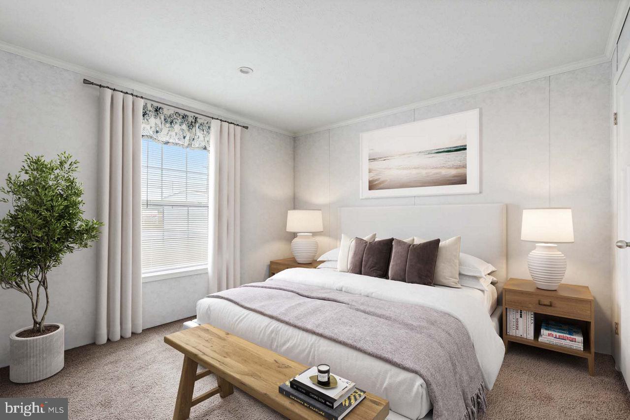 35 Terrace Drive Spring City, PA 19475 - Photo 3 of 6 a bedroom with a large bed and a potted plant